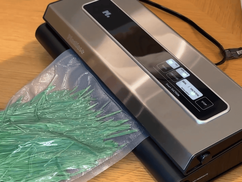 Mesliese Compact Vacuum Sealer in Use